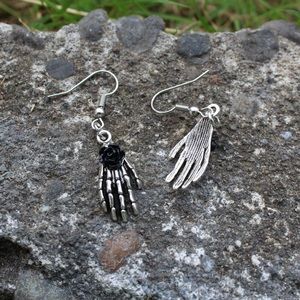 silver skeleton hand earrings